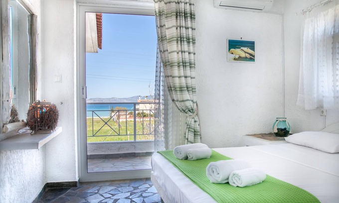 Velon Apartment | Independent condo, with stunning view just a heartbeat away from the beach