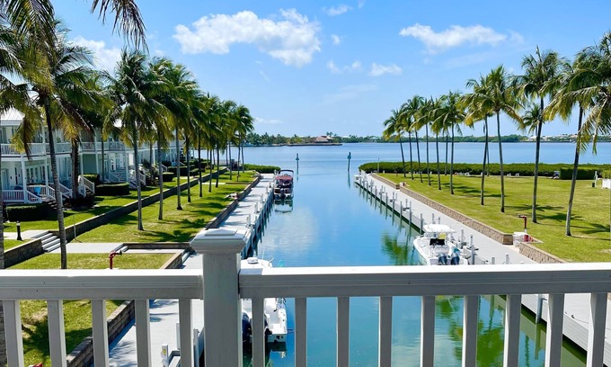 Indigo Reef Marina Homes Villa | Isla Marlin 28: Palm lined luxury villa w/dockage and sunset views