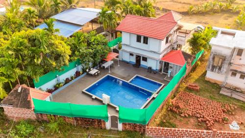 Malvan Villa | Kamal Villa By 3 seasons villas & resorts Nestled in nature, featuring a Private Swimming pool & cozy lawn