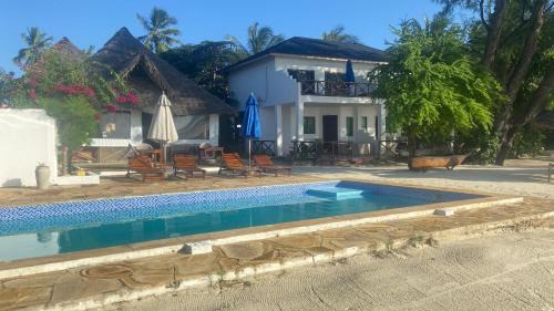 Uroa Hotel | Kaure Sand Beach Lodge