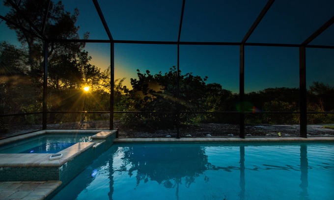 Beachview Country Club Estates House | Key West appeal & gorgeous Sanibel River views& bicycles -Villa Calypso Tides- Roelens Vacations