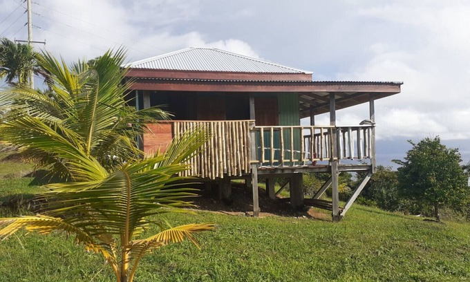 Calibishie Cottage | Kiki's Nature Cabin - studio style cottage with a stunning view
