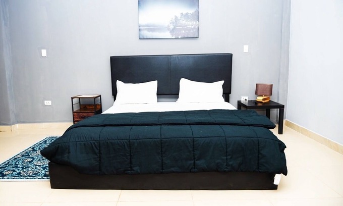 Margibi County Apartment | King Studio Suite with kitchen and Sofa.