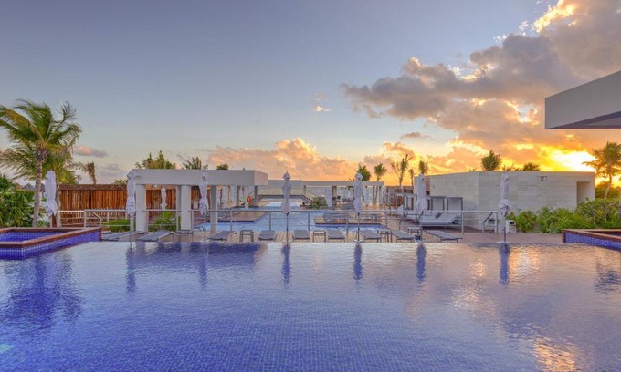 Playa Mujeres Apartment | La Amada Residences Private Beach Getaway with Pools & Gym