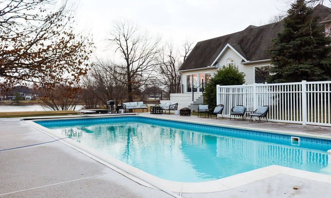 Carl Junction House | Lake Front*100° Heated Pool Year-Round* Hot Tub