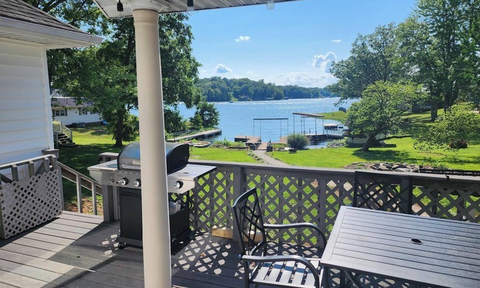 Marion House | Lake Front home Sleeps 10 Overlooking deck for perfect lake views & a coffee bar