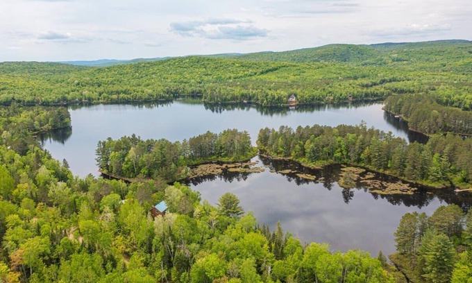 Saint-Didace Ski Chalet | Lake front in the woods. Newly furnished with SPA
