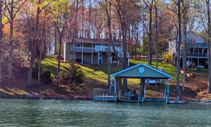 Moneta House | LAKE TIME: Pet friendly, beautifully furnished classic lake home with gentle lot, deep water, and mountain view. Ping ping, foosball and kayaks included.