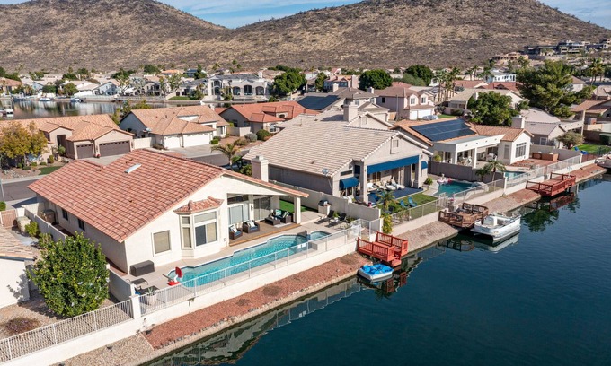Arrowhead Lakes House | Lakefront Home complete with Mountain Views, Pool, Putting Green & Paddle Boat!