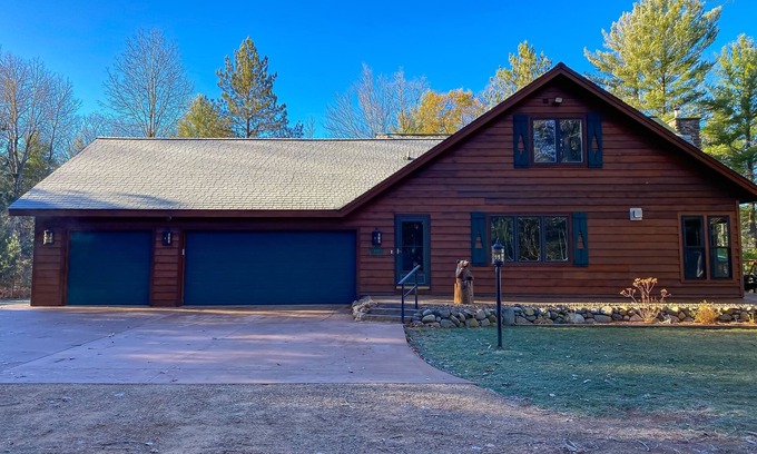 Conover House | Lakefront home with game rooms, dock, kayaks, private beach, fireplace, firepit
