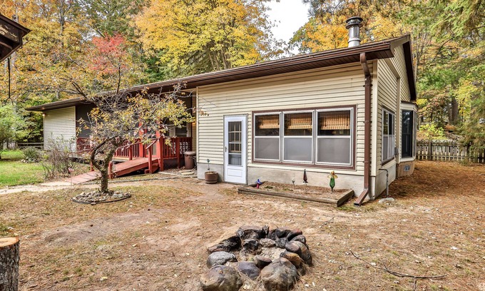 Rhinelander House | Lakefront home with private dock, screened porch, woodstove, fast WiFi, & W/D