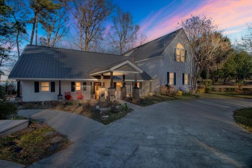 Gilbert House | Lakefront Luxury: Dock Fire Pit Game Room More