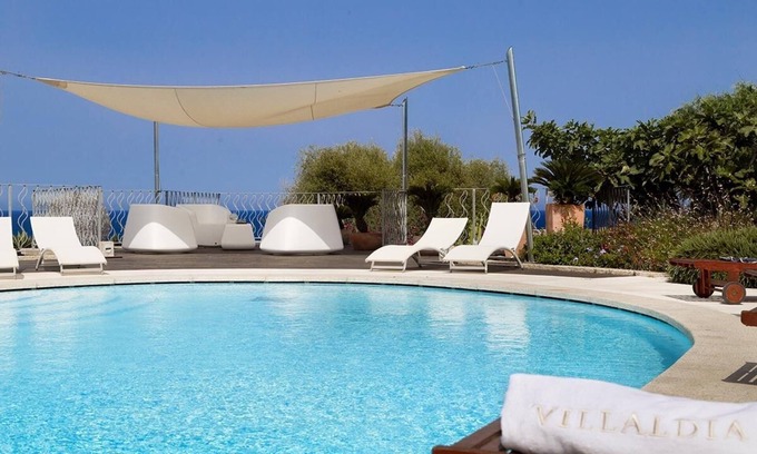 Puntaldia Villa | Large seaview villa a short walk from the beach, restaurants, tennis, marina
