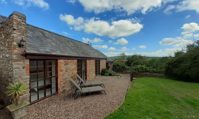 Cornwall House | Light & Airy Vaulted Barn Conversion with a View