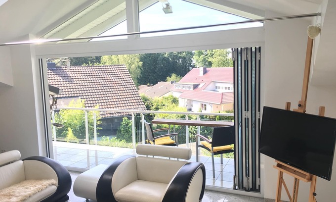 Bensberg Apartment | Light-flooded living room on 140 sqm in Bergisch Gladbach - Moitzfeld