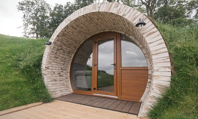 Falkirk Cabin | lily's Pad cabin, built into the side of a hill in the beautiful countryside
