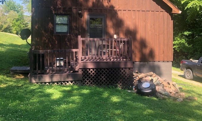 Farmers House | Lofty “Musky Cabin” situated on a hill with musky decor, fire ring, and 2 decks!