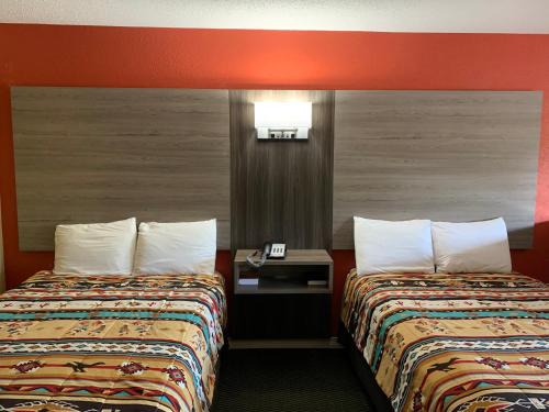 Bay Minette Hotel | Log Cabin Inn