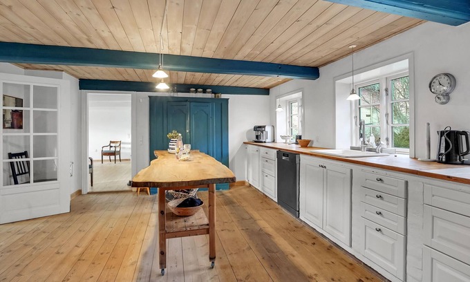 Emmerlev House | Look forward to a beautiful sea view from the terrace of this vacation home near the beach!