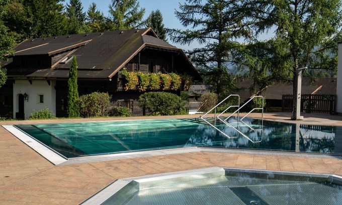 Finkenstein am Faaker See Apartment | Lovely apartment for 4 guests with pool, WIFI, TV, pets allowed and parking