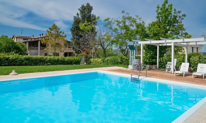 Citta Sant'Angelo Apartment | Lovely apartment for 4 guests with A/C, WIFI, pool, TV, patio, pets allowed and parking
