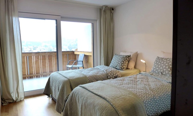Blausee Apartment | Lovely apartment for 4 guests with WIFI, TV, balcony, pets allowed, panoramic view and parking