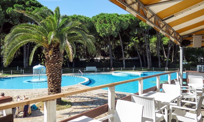 Baia Domizia House | Lovely apartment in villa for 6 guests with A/C, pool, WIFI, TV, patio and parking