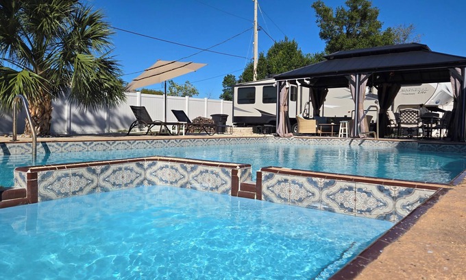 Deltona Lakes House | Lovely RV with outdoor pool and Jacuzzi.
