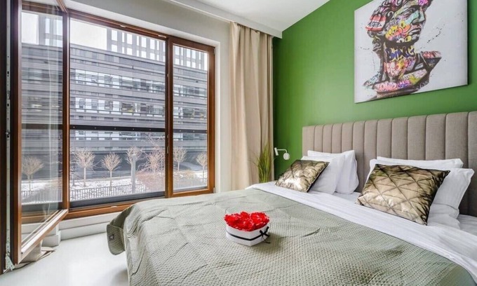 Wola Apartment | Lumina lux apartment near Uprising Museum