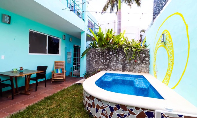 Colonia Andres Apartment | Luna - Alexa art loft w extras - bicycles & snorkel gear. shared pool & grill