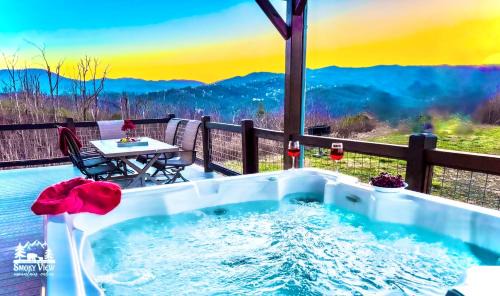 Gatlinburg - Pigeon Forge House | LUXURIOUS 6 Bed 5 Bath CABIN AMAZING LOCATION & PRIVACY! -4 Miles to Gatlinburg & Pidgeon Forge-Hot tub-Fireplace-King Suits-Deck-Grill-Free Parking for 8 Vehicles-Firepit-Full Kitchen-"Smoky View Cabin"