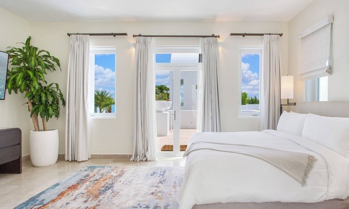 Rendezvous Bay House | Luxurious 5BR Estate Home w/Pvt Pool, Hot Tub, Beach Views, Golf Cart & More