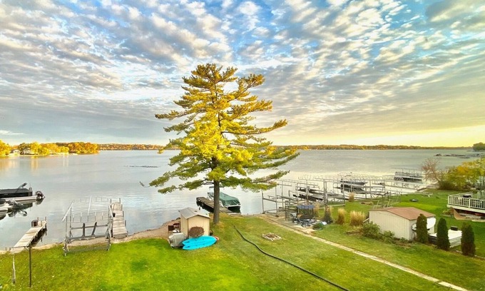 Pewaukee House | Luxury Lakefront Home w Miles of Lake Views, private pier, lake toys & game room