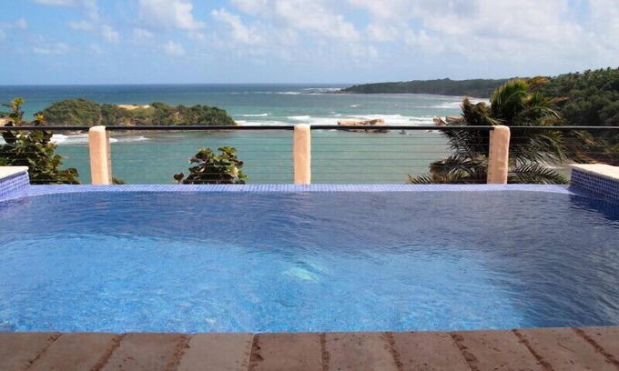 Calibishie Villa | Luxury private beachfront villa with spectacular views