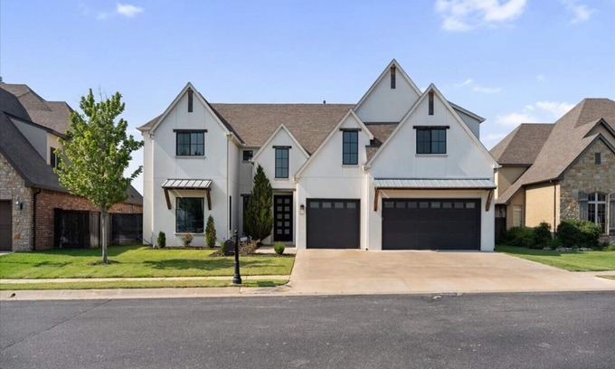 Tulsa County House | Luxury Riverside Home with Theatre