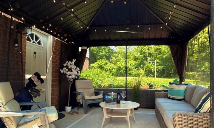 Sedgefield Apartment | Luxury Suite, patio, Gazebo, hammock, sauna, fence