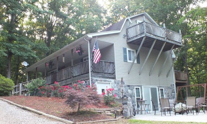 Peebles House | Luxury & Tranquility on 8 Acres Bordering Brush Creek! Secluded 3-level home.