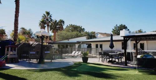 Canyon Gate Villa | Luxury Villa, with bonus pool house, Private Pool, Hot tub, rock water fall and slide, putting green, basketball, shuffle board, play gym, privately gated on circular driveway.