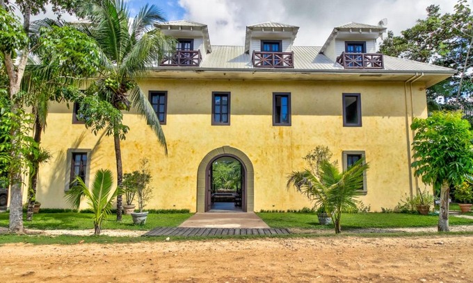 Bullet Tree Falls House | Mahogany Hall Gold Standard Certified