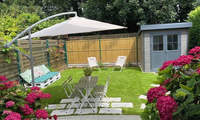 Domont House | Maisonette with garden