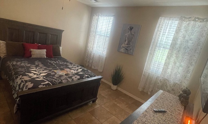 Biggs Field House | Master bedroom with its own full bathroom and walking closet + shared spaces.