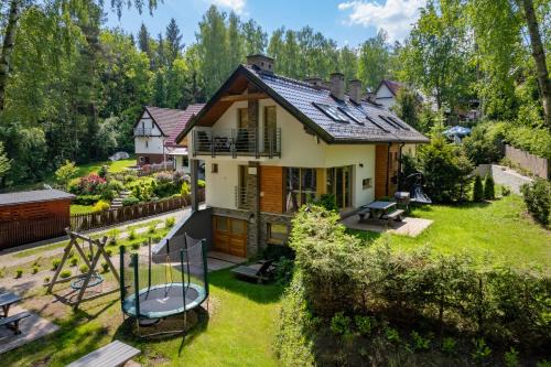 Gledy Apartment | Mazursko - komfortowe apartamenty nad jeziorem, sauna, kominki na parterze