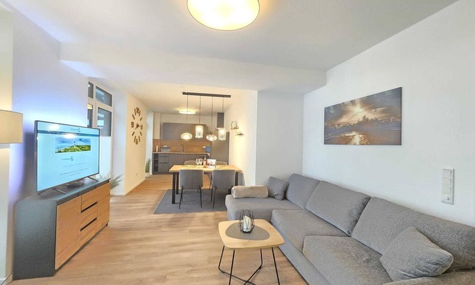 Suderneuland I Apartment | Meeresrauschen - vacation with terrace, sauna & garden at the Norder Marina