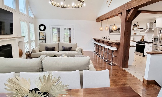 Paw Paw Lake House | Modern cottage w/sauna, fire pit, outdoor dining, pool table, & sunroom