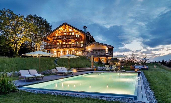 Frasdorf Apartment | Modern chalet style with private sauna, fireplace, hot tube, pool with Chiemsee view