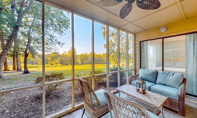 Sea Trail Condo | Modern condo with sunroom - dog and snowbird-friendly