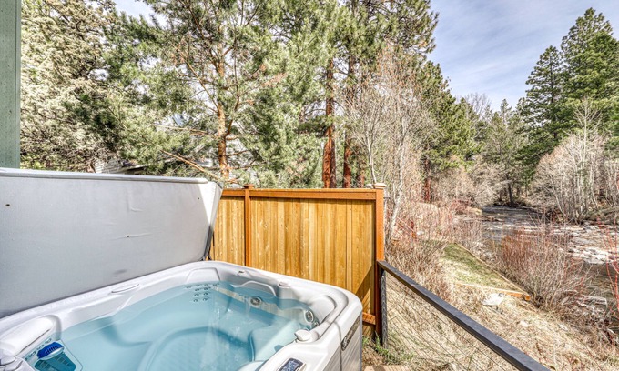 Sisters House | Modern riverfront home w/a private hot tub & gas fireplace in a quiet community