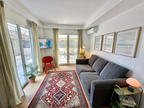 Olymbiaki Akti House | Modern Seaside Retreat with Private Patio and Parking - Blue Zone Homes