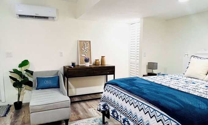 Walsingham Apartment | Modern Studio 10 Min to Beach with Kitchen, AC, Fast Wi-Fi and Private Bathroom.