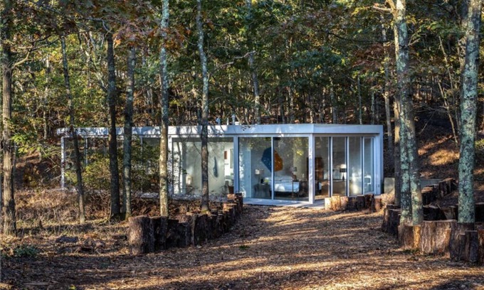 Water Mill House | Modernist Glass House nestled in tall pines and nature offering total privacy